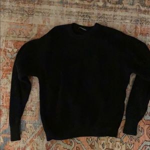 Black crew neck sweater